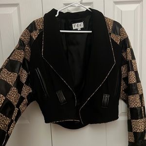 Vintage Animal print jacket with square detailing. TLC is the brand size L